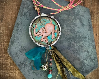 pink elephant talisman necklace, hand pyrographed with silk, beads and bell
