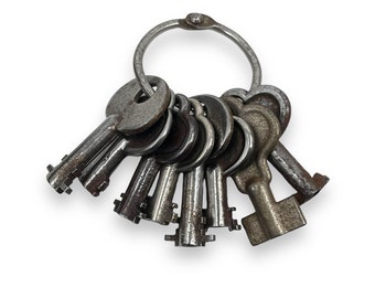 Set of 8 Antique Skeleton Keys on Keychain / Collectibles