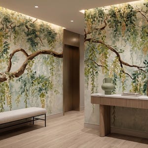 May include: A hallway featuring a mural of a large tree with green leaves and hanging yellow flowers. A light-colored bench with a black metal frame sits on the left, while a wooden console table with a white top stands on the right.