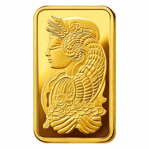 Puede incluir: Un lingote de oro rectangular con un dise&ntilde;o en relieve de una figura de perfil que lleva un tocado con espigas de trigo y sostiene un cuerno de la abundancia lleno de monedas. La superficie tiene un acabado met&aacute;lico pulido y brillante.