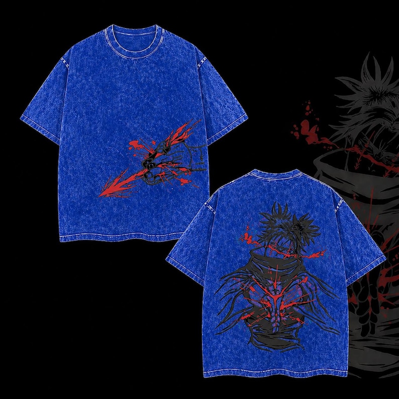 May include: Two blue t-shirts with graphic designs. One features a red and black arrow design on the front. The other displays a black and red character design on the back. The shirts have a textured finish.