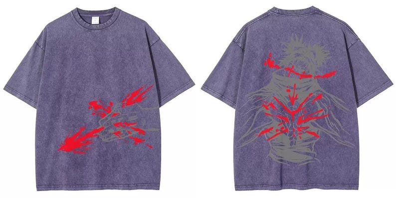 May include: A purple t-shirt with short sleeves, featuring a graphic on the front and back. The front has a red and grey abstract design. The back displays a similar design in red and grey, depicting a figure.