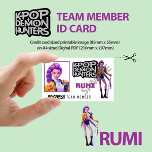May include: A KPOP Demon Hunters team member ID card featuring a purple-haired character named Rumi. The card is credit card sized, with a printable image of 85mm x 55mm. The design includes the KPOP Demon Hunters logo and the text "TEAM MEMBER ID CARD".