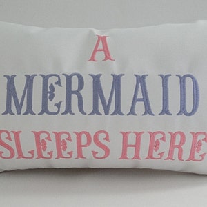 Mermaid pillow cover 12" x 20" A MERMAID SLEEPS HERE Sunbrella white indoor outdoor fishtail font embroidered Oba Canvas Co original design