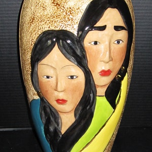 Ceramic Vase with Man and Woman Hand Painted and Accented in Gold.