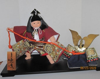 Vintage Beautiful Samurai Doll with his Helmet with traditional Silk Dress.