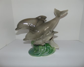 Two Dolphins and a baby on a Coastal Wave Figurine