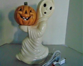 Halloween Ghost Lamp Holding a Pumkin