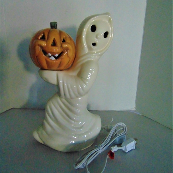 Halloween Ghost Lamp Holding a Pumkin