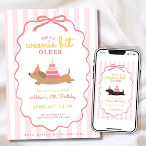 May include: A birthday invitation card and a smartphone displaying the same design, featuring a light pink striped background, a brown dachshund wearing a party hat with a tiered cake on its back, and the text She's a weenie bit OLDER.