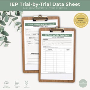 May include: Two wooden clipboards with white paper, featuring the text "IEP Trial-by-Trial Data Sheet" and "Daily Goal Monitoring + Proof of Service." One clipboard has a "Session Summary & Service Protocol" form, and the other has a "Daily Goal Data Collection" form. The image also includes icons for digital download, printable PDF, and IEP informed.