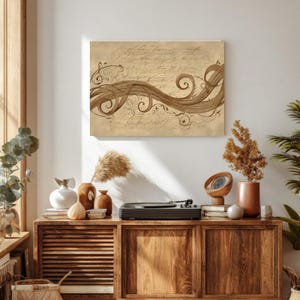 May include: A framed artwork featuring a sepia-toned design of flowing lines and swirls, resembling hair or a ribbon, against a backdrop of handwritten script. The artwork hangs above a wooden cabinet with a record player and decorative vases.