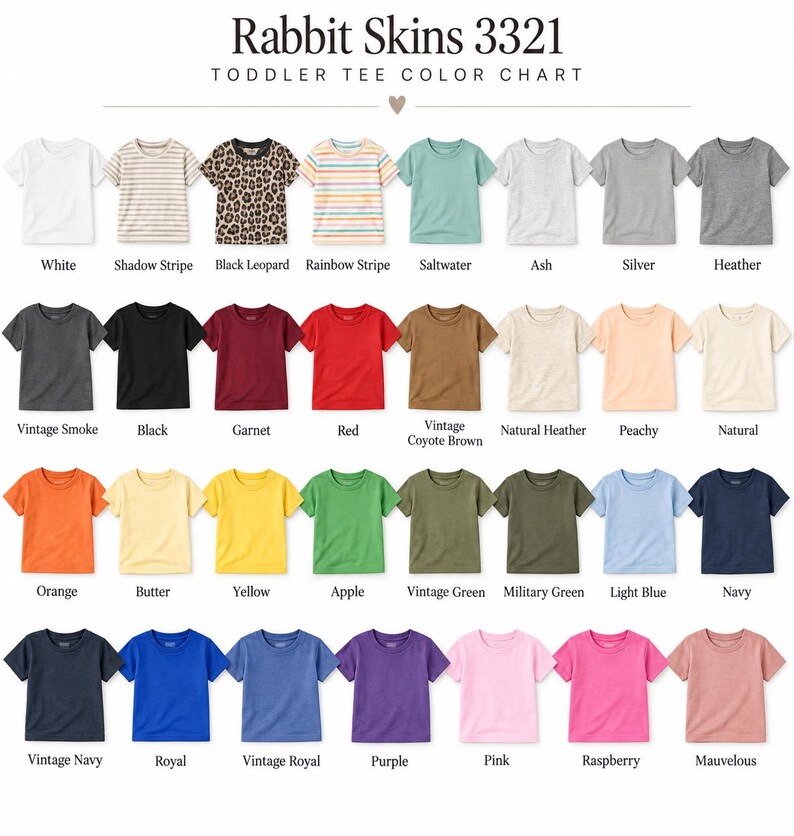 May include: A Rabbit Skins 3321 toddler tee color chart displaying thirty-two short-sleeve t-shirts in various solid colors, stripes, and patterns. Each shirt is labeled with its specific color name, including white, black, red, and navy.
