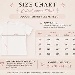 May include: A size chart for a Bella+Canvas 3001T toddler short sleeve tee. The graphic displays a white t-shirt with width and length arrows, a table listing sizes 2T through 5T with measurements in inches and cm, and text notes on sizing.