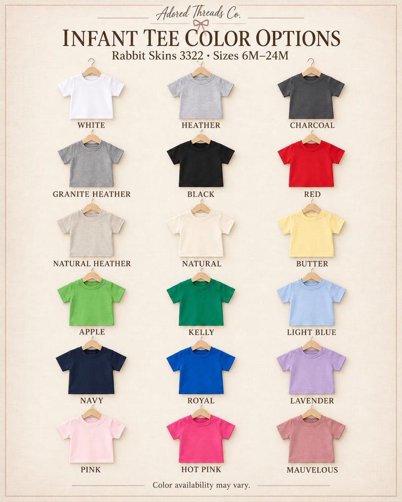 May include: A color chart for Rabbit Skins 3322 infant tees in sizes 6M-24M, featuring 18 short-sleeve shirts on hangers in white, heather, charcoal, granite heather, black, red, natural heather, natural, butter, apple, kelly, light blue, navy, royal, lavender, pink, hot pink, and mauvelous.