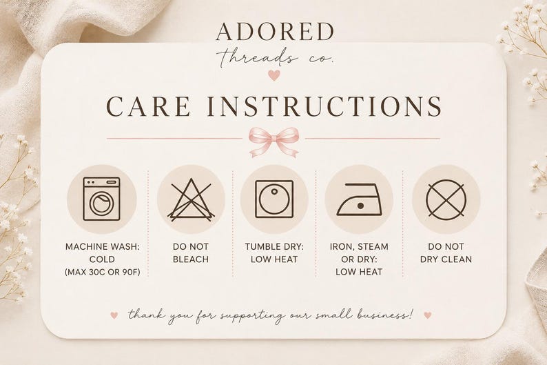 May include: A rectangular care instruction card with rounded corners featuring the text ADORED Threads co. and CARE INSTRUCTIONS. It displays five icons for machine wash cold, do not bleach, tumble dry low, iron low, and do not dry clean.