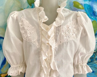 Vintage Victorian inspired blouse with ruffles and midi puff sleeves