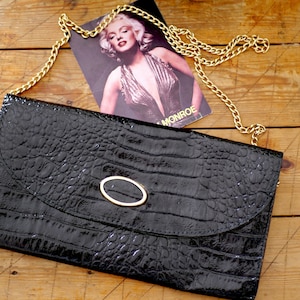 Clutch Mid Century con correa de cadena Crock negro