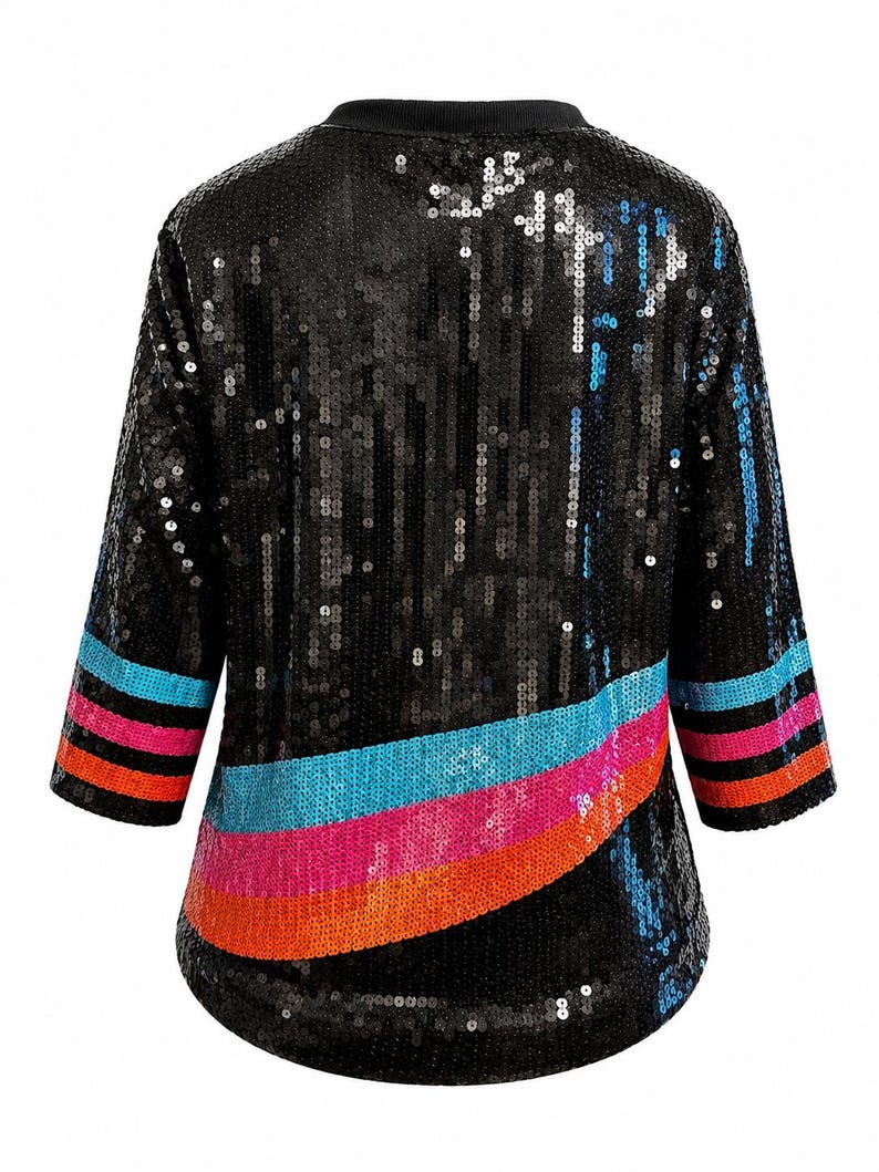 May include: A black sequined top featuring three-quarter length sleeves and a round neckline. The garment is decorated with horizontal stripes in bright blue, pink, and orange across the lower section and on the sleeves, creating a vibrant contrast.
