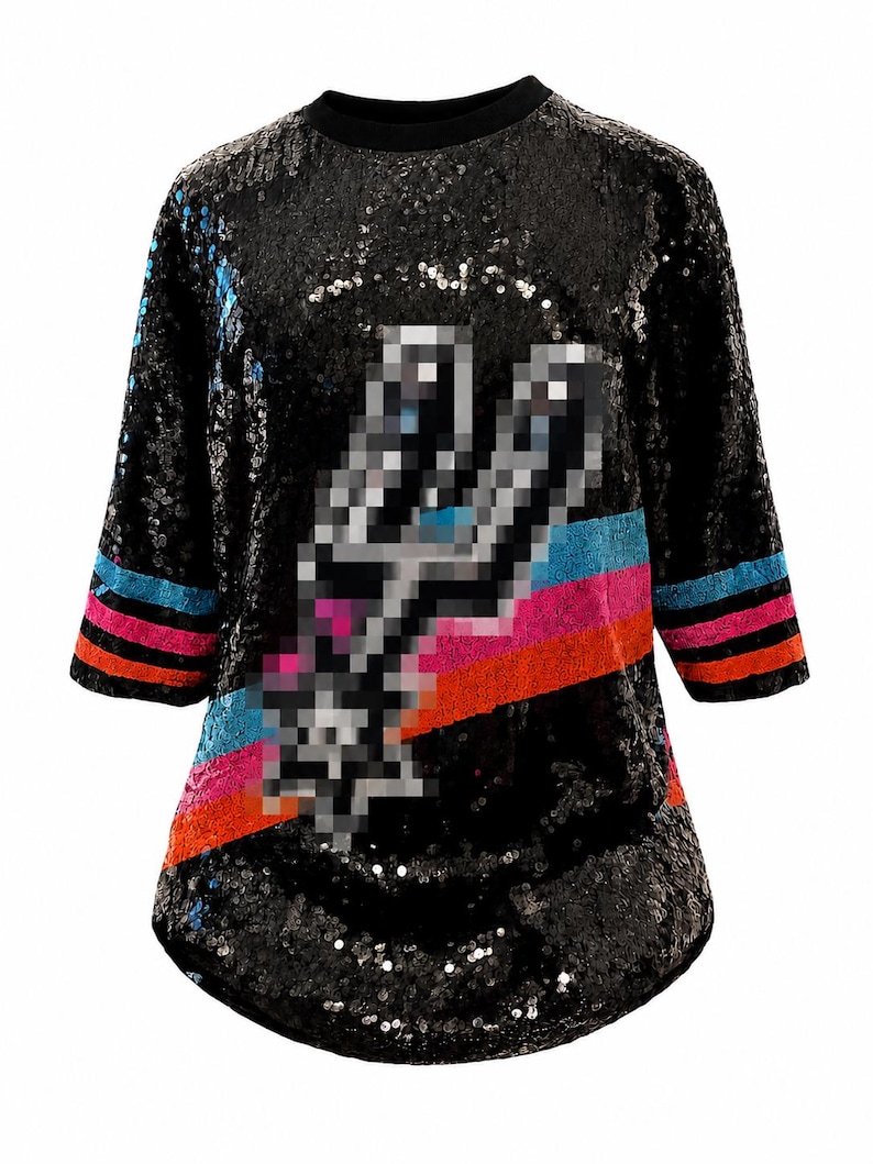 May include: A black sequined shirt featuring a pixelated silver spur logo in the center. The sleeves have horizontal stripes in light blue, pink, and orange. The garment has a round neckline and three-quarter length sleeves covered in black sequins.