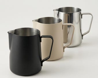 Jarra de acero inoxidable 304 para espumar leche con escala interna.