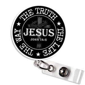 May include: A black and white badge reel with the text "THE TRUTH THE LIFE THE WAY" encircling a cross and the word "JESUS". The text "JOHN 14:6" is also visible. The badge reel has a clear plastic strap and a metal clip.