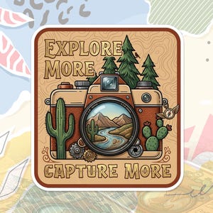May include: A square sticker featuring a vintage camera illustration with the text "EXPLORE MORE CAPTURE MORE." The camera lens displays a landscape scene. Cacti and pine trees flank the camera, with a compass and gears adding detail. The sticker has a brown and tan color scheme.