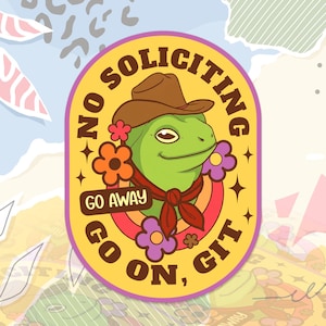 May include: A sticker with a yellow background featuring a green frog wearing a brown cowboy hat and a red bandana. The text reads NO SOLICITING, GO AWAY, and GO ON, GIT. The design includes orange and purple flowers and a rainbow arc behind the frog.