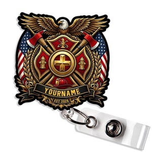 May include: A circular badge reel featuring a firefighter emblem with a central gold cross, two crossed axes, a fire hydrant, and a red helmet. An eagle sits atop the crest, flanked by two American flags. A black banner reads YOURNAME EST 2026.