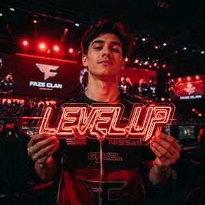 May include: A bright red neon sign displaying the text LEVEL UP in a bold, stylized font. The sign is held by a person wearing a black and red jersey with the text NISSAN and GFUEL printed on the front, set against a dark esports arena background.