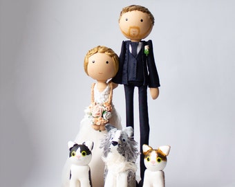Cake figures for the wedding - adapted to the look of the bride and groom with DOG