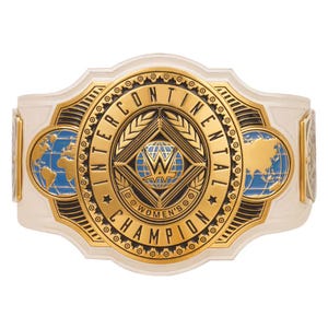 May include: A championship belt featuring a large gold center plate with black accents and white side straps. The plate displays the text INTERCONTINENTAL WOMEN'S CHAMPION, a central globe logo with a W, and two blue and gold globe side panels.