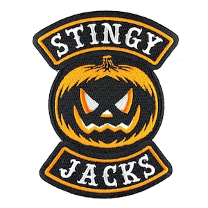 May include: Black and orange embroidered patch with a pumpkin face and the text "Stingy Jacks" in white.