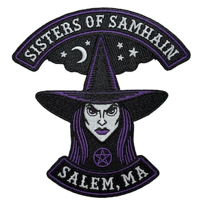 May include: Embroidered patch featuring a witch with purple hair and a pointed hat. The patch reads "SISTERS OF SAMHAIN" above the witch and "SALEM, MA" below. The design includes a crescent moon, stars, and a pentagram.
