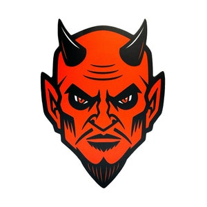 May include: A stylized illustration of a devil's head with a red face, black horns, and a goatee. The devil has an angry expression with red eyes and a stern look. The image is a graphic design with a bold, contrasting color scheme.