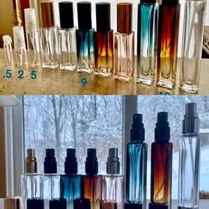 May include: Collection of glass perfume bottles in various sizes and colors. The bottles have different colored spray tops and some have metallic caps. The bottles are labeled with numbers .5, 2, 5, 9, and 10.