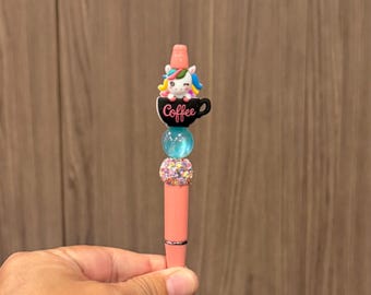 Unicorn in a coffee cup beaded pen