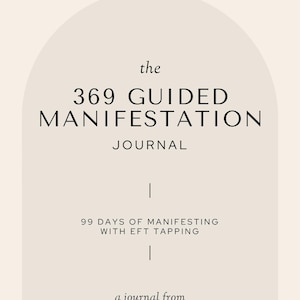 May include: A cream-coloured journal cover with the text "the 369 GUIDED MANIFESTATION JOURNAL". Below, it reads "99 DAYS OF MANIFESTING WITH EFT TAPPING". The journal is from Kristen Brianne, IT'S_EMOTIONAL_BLISS.