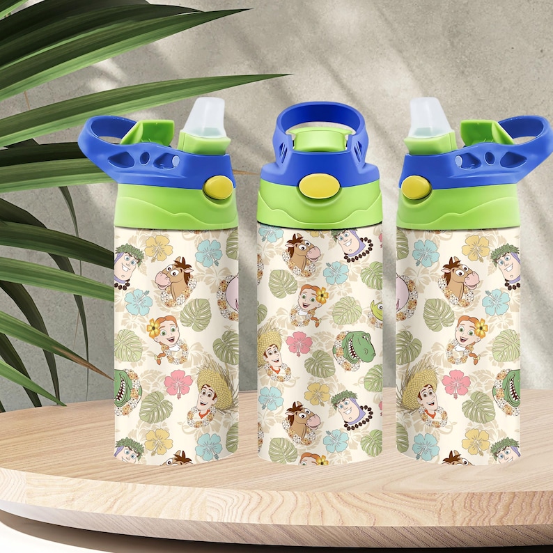 May include: Three cylindrical water bottles featuring a repeating pattern of cartoon characters and tropical foliage. The bottles have a cream background with light blue, pink, and yellow hibiscus flowers, green monstera leaves, and character faces.