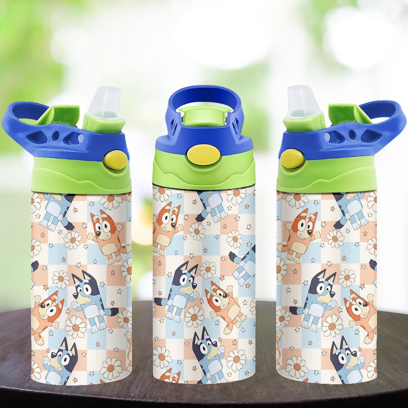 May include: Three water bottles with blue, green, and yellow lids. The bottles feature a repeating pattern of cartoon dogs, daisies, and stars on a checkered background. The bottles are designed for kids.