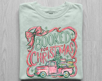 Booked For Christmas Pink Truck Shirt, Truck Full Of Books Tree Tee, Coquette Bookish Christmas Shirt, Comfort Colors Reader Tee