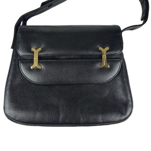1970s black handbag / adjustable strap image 1