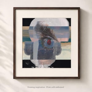 May include: A square framed print featuring a layered, abstract portrait with a prominent human eye. The composition includes horizontal bands of blue, beige, and black, with a striking red iris. The text at the bottom reads: Framing inspiration - Print sold unframed.