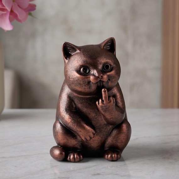 Kichernde Katze mit Mittelfinger