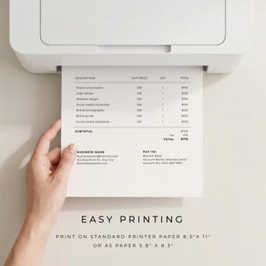 May include: A white printer outputting a document with a business invoice template. The document lists services like brand consultation and logo design with prices, a subtotal of $700, and a total of $770. Text includes business contact details.