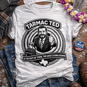 May include: White t-shirt with a graphic of a man with a suitcase and the text "TARMAC TED". The shirt is on top of blue jeans, with a pair of brown boots, a water bottle, and a "CRUZ for Senator" button.