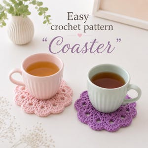 May include: Two round crochet coasters, one light pink and one purple, each featuring a scalloped edge design. A light pink mug sits on the pink coaster and a light blue mug sits on the purple coaster. Text reads: Easy crochet pattern Coaster.