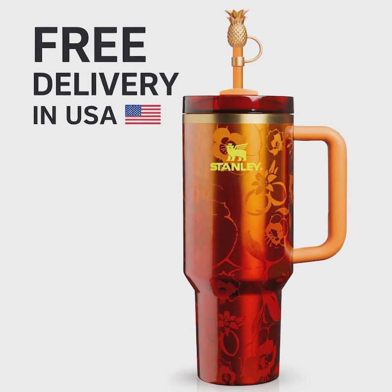 May include: A Stanley brand tumbler in a deep red and orange gradient finish with a floral pattern. It features a gold-toned rim, a solid orange handle, and a matching orange straw topped with a small, metallic gold-colored pineapple ornament.