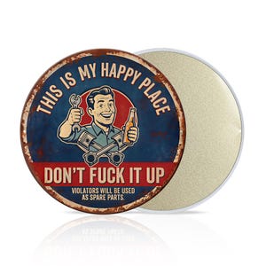May include: Round metal sign with a vintage design. The sign features a smiling man holding a wrench and a beer bottle, with the text "THIS IS MY HAPPY PLACE" and "DON'T FUCK IT UP". The sign has a distressed, rusty look.