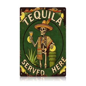 May include: A rectangular metal sign with a green background and a skeleton wearing a sombrero, holding a drink. The sign reads "TEQUILA SERVED HERE" in white text. The sign has a distressed, vintage look.